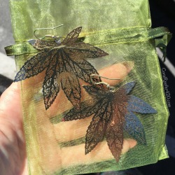 coralreefer420:  Boosted up my pot leaf earrings for the day