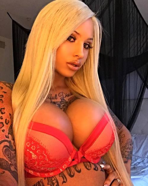 Real life Barbie doll, Julia Nicole Newby has a stunning, tanned body with funky tattoos and perfect fake tits  Follow Fake Tits Club on Tumblr  Fake Tits Club is full of free porn pics and GIFs of stunning, hot and sexy babes with perfect fake tits.