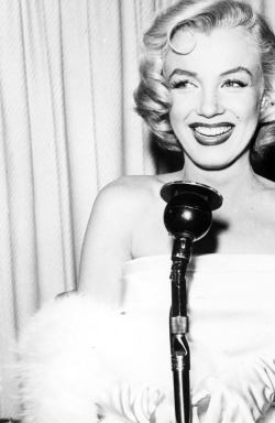 :  Marilyn Monroe attending the premiere of Call Me Madam, 1953.