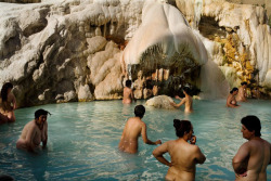 From Paradise Rivers, by Carolyn Drake.     Women soak in the main pool at Garm Chashma, a Soviet resort built in the Tajik Pamir mountains in 1957 next to rich mineral springs. The water from these mountains feeds the Amu Darya river, which supports