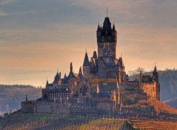 Like a phoenix rising (Reichsburg Castle, Germany, built in c.1000. Destroyed by French troops in 1689, the ruins were purchased by a German businessman in the 1800s who subsequently completely rebuilt the castle)