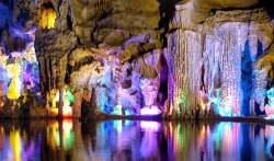 sixpenceee:  Reed Flute Cave, ChinaThe lighting in this colorful