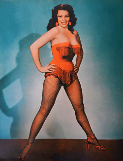 burleskateer:  Camille is featured on the back cover of ‘FOLIES