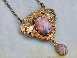 wickedclothes:  Victorian Pink Fire Opal Locket This brass locket