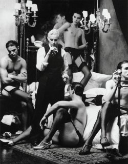 madonnascrapbook:  A dragged out Madonna with her harem of boys