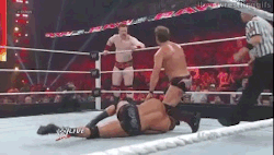 Chris Jericho showing off the guns to Sheamus while pinning Orton