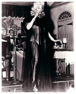 Lilly Christine     aka. “The Cat Girl”..   Performing on stage at ‘Prima’s 500 Club’ in New Orleans, sometime in the early 1950’s..  