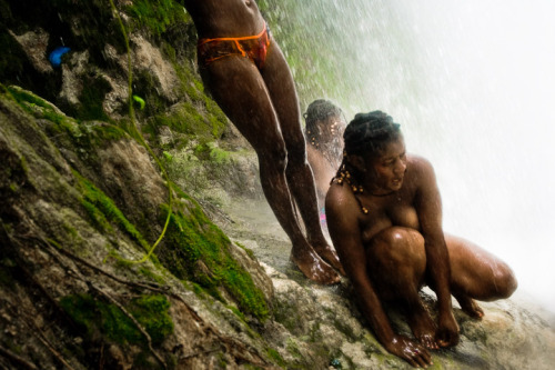 yearningforunity:  Haitian women perform a bathing and cleansing ritual under the waterfall during the annual religious pilgrimage in Saut d’Eut, Haiti.   Renewal of nature’s most potent force….#theblackwoman