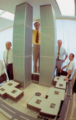 Architect Minoru Yamasaki (right) posing with a model of the