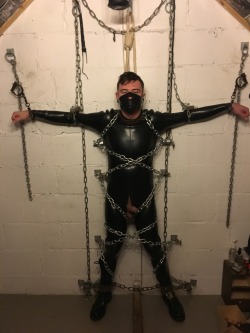 jamesbondagesx:  Intruder stripped to rubber, restrained and