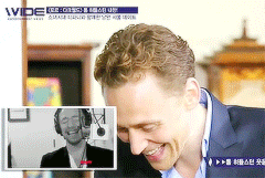 madisonyork:  Tom Hiddleston watching his laughing video [x]