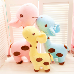 aplgsbabygirl:  chessiwessi:  kawaiiteatime:  giraffe plushies  Ahhh where are these from??  oh my goodddd. they sell it in purple tooooo. 