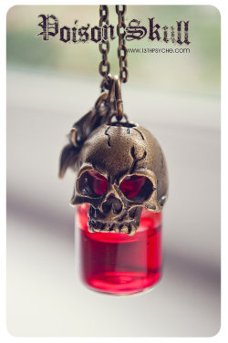 almostlolita:  Gothic bottle necklaces featuring a skull and