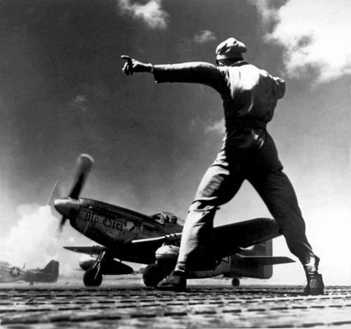 warhistoryonline:  P-51 Mustang taking off from Iwo Jima. https://wrhstol.com/2wD8w1W