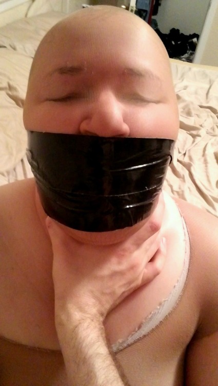 bpcouple:  Been a while so here. Subby gagged and hooded.  Nice tape gag!