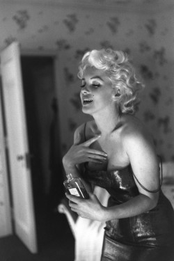 womensweardaily:  Marilyn Monroe’s Chanel No.5 Redux On her