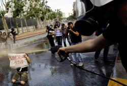 occupygezipics:  The same protester holding the ‘Chemical Tayyip