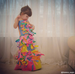pbsparents:  Paper. All these dresses are made of PAPER. Here
