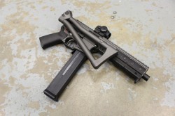 revengeofthemudbutt:  badger-actual:LWRC SMG-45.  coffeeandspentbrass,