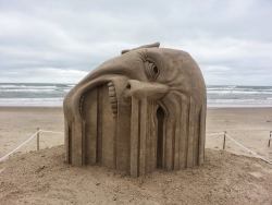 sixpenceee:  Incredible “Bleeding” Sand Sculpture by Guy-Olivier