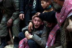 american-radical:  A boy named Ahmed mourns his father, who was