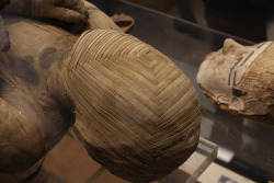 sixpenceee:This intricately wrapped mummy is located at the Louvre
