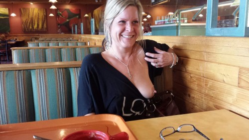 scottnikipowers:  Niki showing her tits at sweet tomatoes on Camelback and central  Love that couple, always seem so happy!