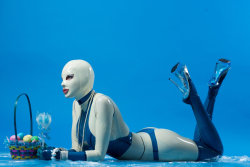 latex-passion:  White & blue latex suit (XPost from r/Ariane)