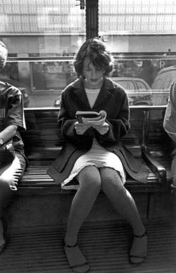  Ferdinando Scianna  Milan. woman reading in the tramway. 1997