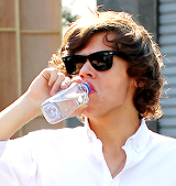   Harry Styles + water bottles (pt.2)  