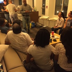 Playing charades in the element hotel ..why is a infant around this loud group lol have fun people!!:-)