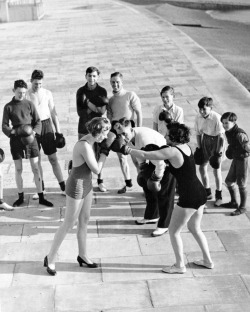 Reg Speller - Two female members of a keep fit group learn boxing