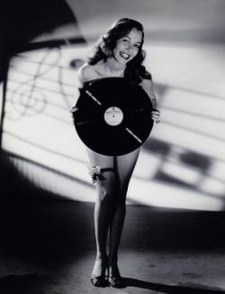 damsellover:  Monica Lewis showing off her vinyl. 