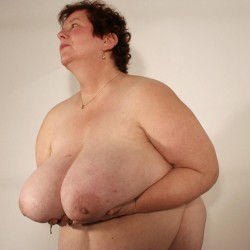 Big humongous gorgeous breasts, an enormous belly, and although