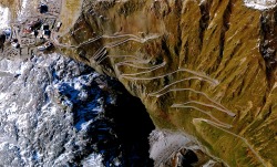 dailyoverview:The Stelvio Pass is a road in northern Italy that