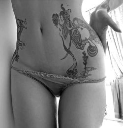 ilovetattooedwomen:  Reblog it if you think this ones hot!www.ilovetattooedwomen.com