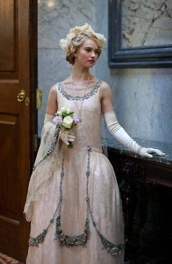 fashionandcostumes:Lily James as Rose MacClare in Downton Abbey