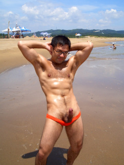 A beautiful man showing his hard cock at the beach…the