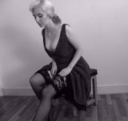 Sweetcherrry in a set of thigh highs and a retro dress looking