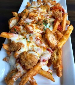 yummyfoooooood:   Garlic Parmesan Fries With Boneless Wings,