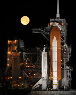 spaceexp:  STS-119 Shuttle Discovery With Moon Source: NASA HQ