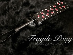 fragilepony:  Giant blood rose leather paddle whip at Fragile