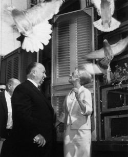 classichorrormovies:  Alfred Hitchcock and Tippi Hedren behind