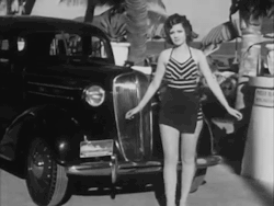 publicdomaindiva:  A Miami bathing beauty models 1936 beach fashions