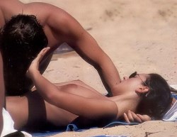 toplessbeachcelebs:  Monica Bellucci (Actress) sunbathing topless
