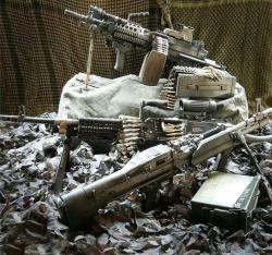 special-operations:  Happiness is a belt fed machine gun