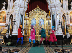 flavorpill:  This photo is of Pussy Riot in a Moscow church and