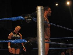 rwfan11:  Is Mr. Kennedy checking out Batista’s ass? 
