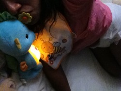 My stomach really hurts, but teddy and my seahorse are with me