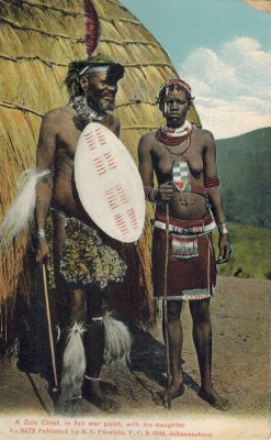 the-two-germanys:  A Zulu chief in full war paint, with his daughter.Postcard,